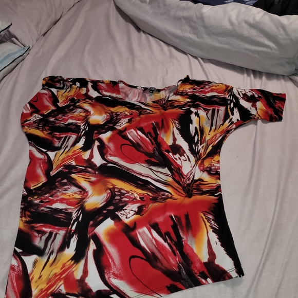 Ladies Artizan asymmetrical silky top. Can be worn super sexy off the shoulder. - Picture 3 of 4